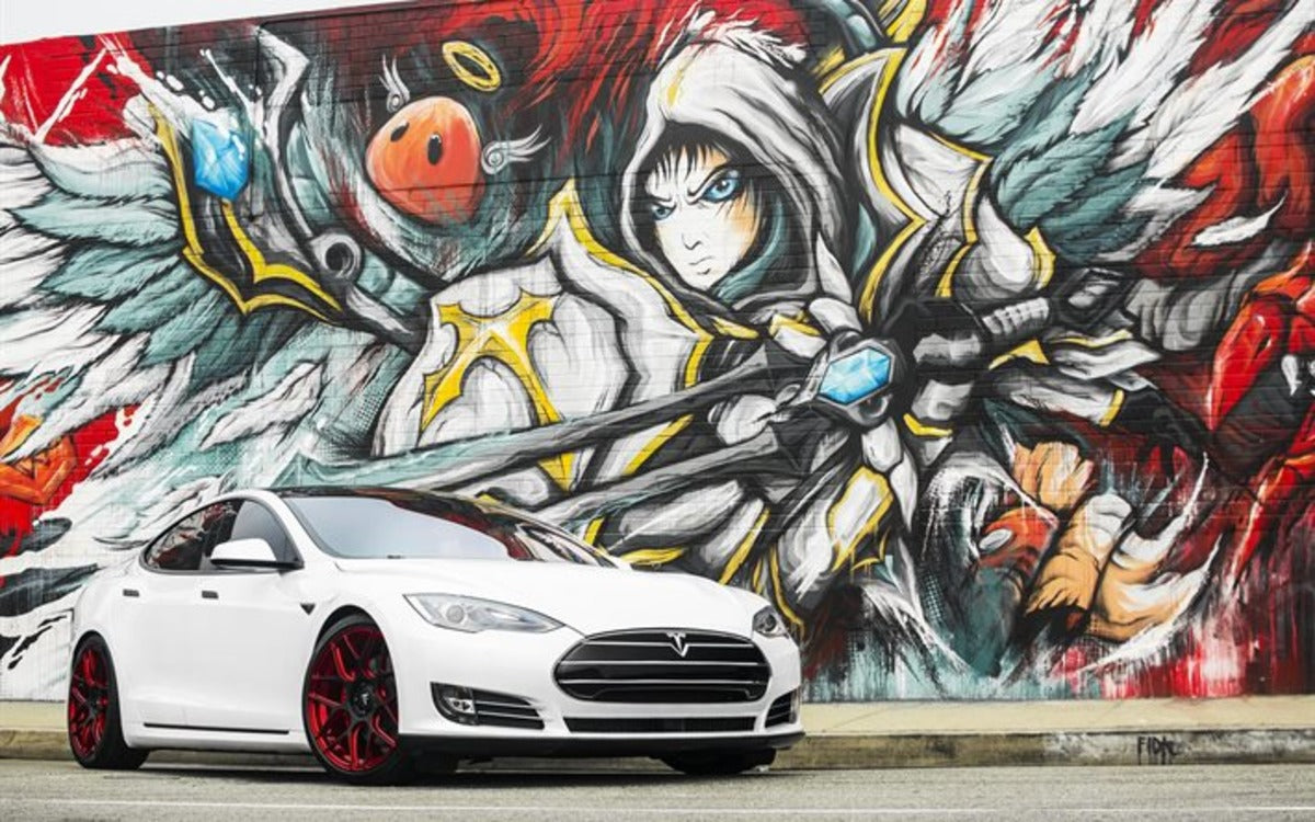 Tesla Invites Artists to Help Cover Giga Berlin in Awesome Graffiti Art