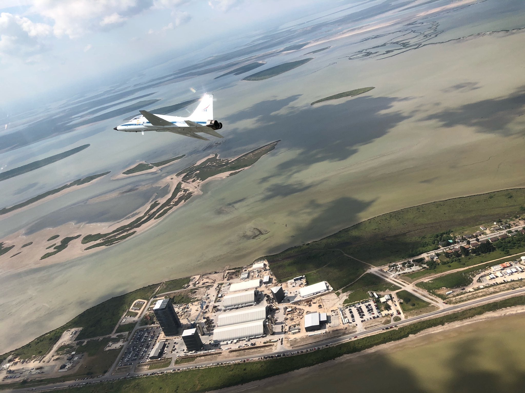 NASA Astronauts fly over SpaceX's Starship facility in South Texas