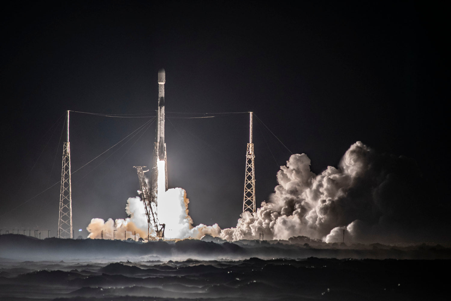 SpaceX flight-proven Falcon 9 launches 54 Starlink satellites to orbit from Florida’s Coast after multiple weather delays