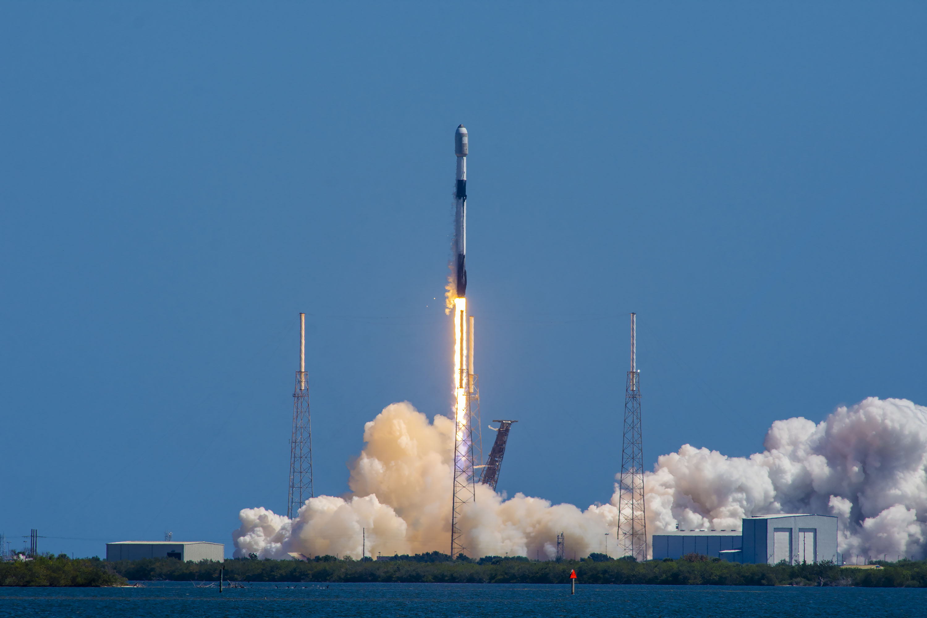 Flight-proven SpaceX Falcon 9 rocket launches 56 Starlink satellites to orbit