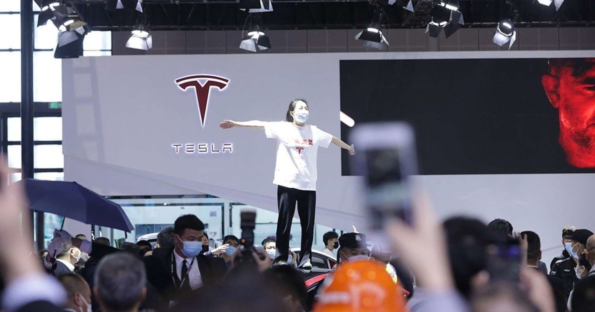 Tesla Sues Car Roof Protestor from Auto Shanghai 2021 for Brand Damage