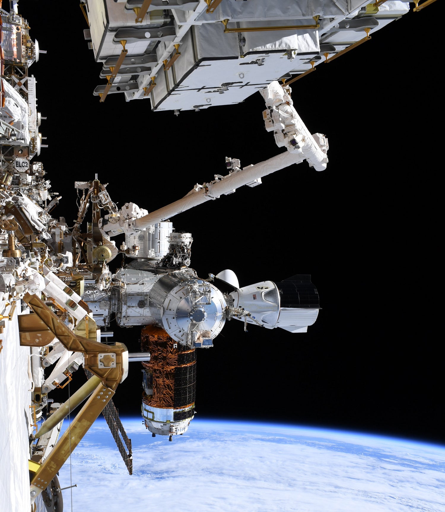 NASA Astronauts share a 'wonderful view' of SpaceX's Crew Dragon during spacewalk