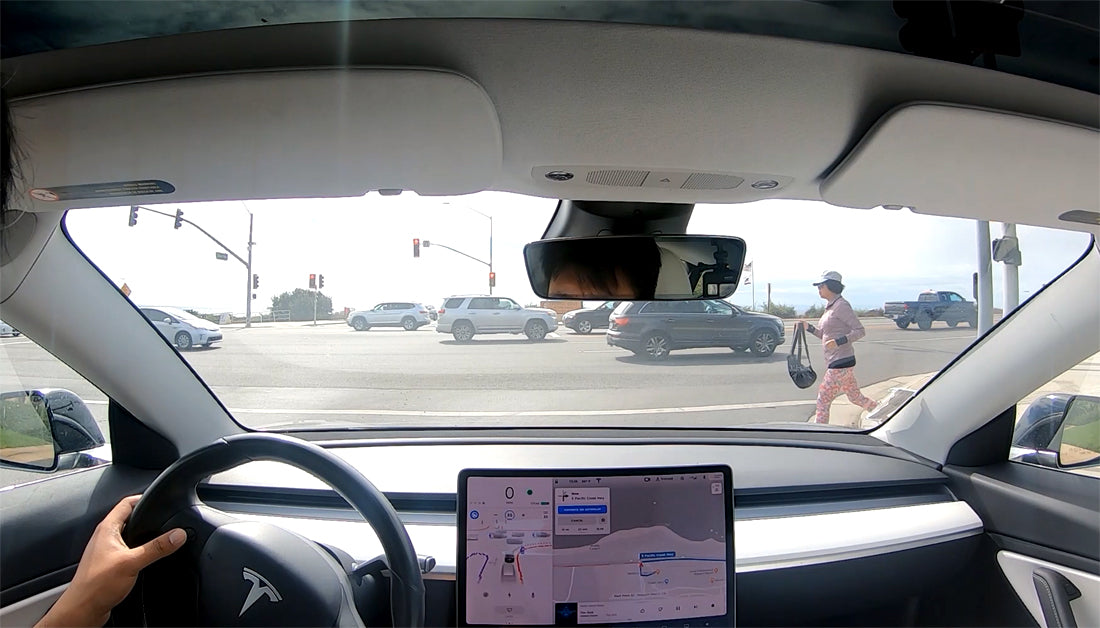 Tesla Full Self-Driving FSD Safely Turns Right on Red Light, Negotiates Pedestrian Traffic