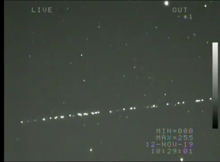 SpaceX Starlink satellite train visible in the night sky