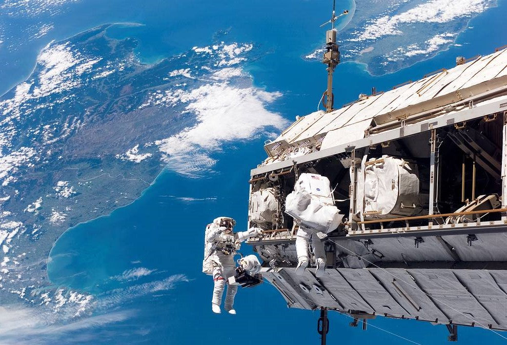 NASA Astronauts conduct a Spacewalk to replace batteries at the Space Station
