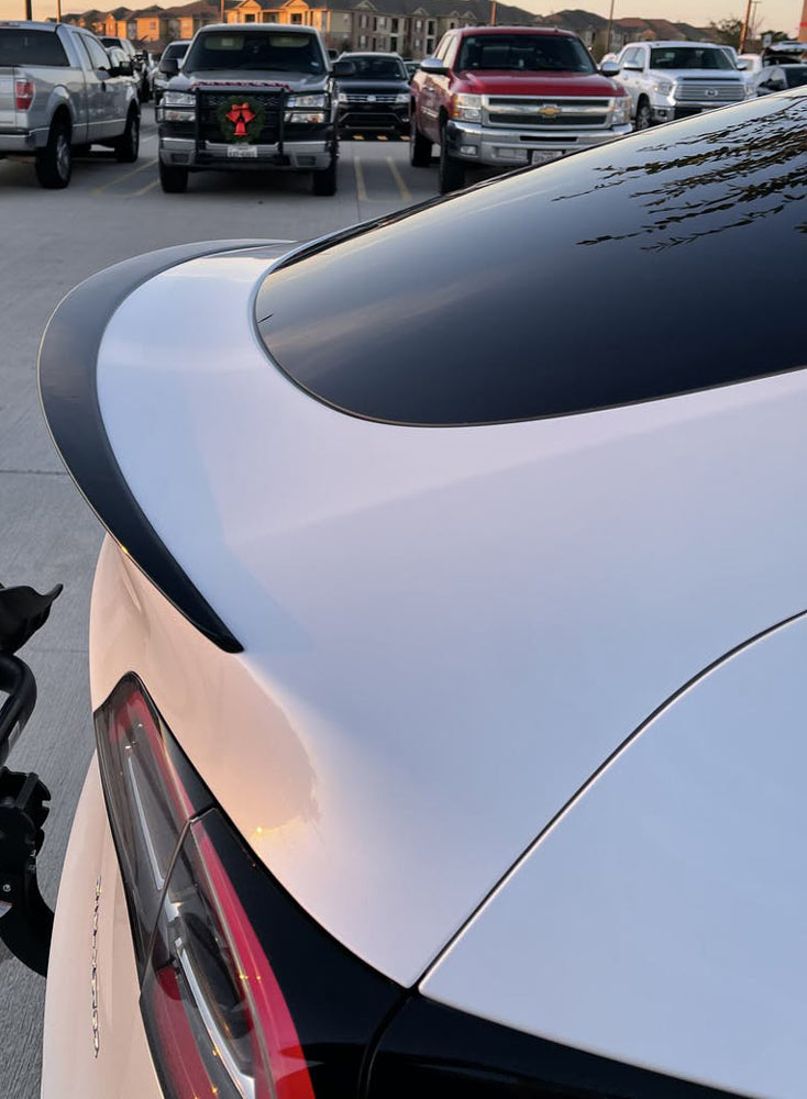 Anyone have Tesla upgrade their MYLR with the carbon fiber spoiler
